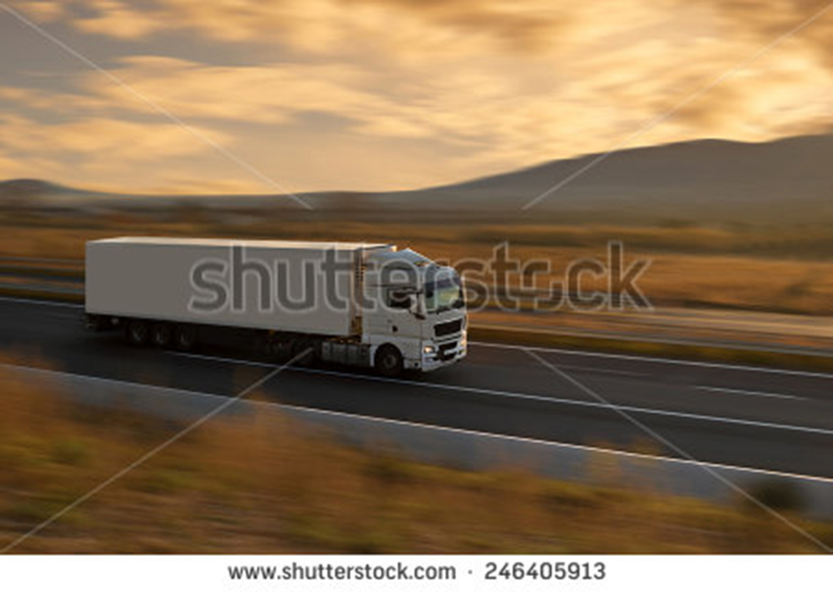 stock-photo-white-semi-truck-on-highway-246405913
