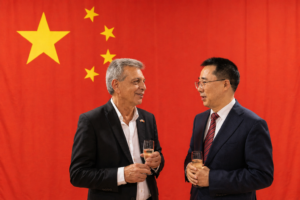 HE Ambassador Zhang (left) together with Mr. Hugh Arrigo